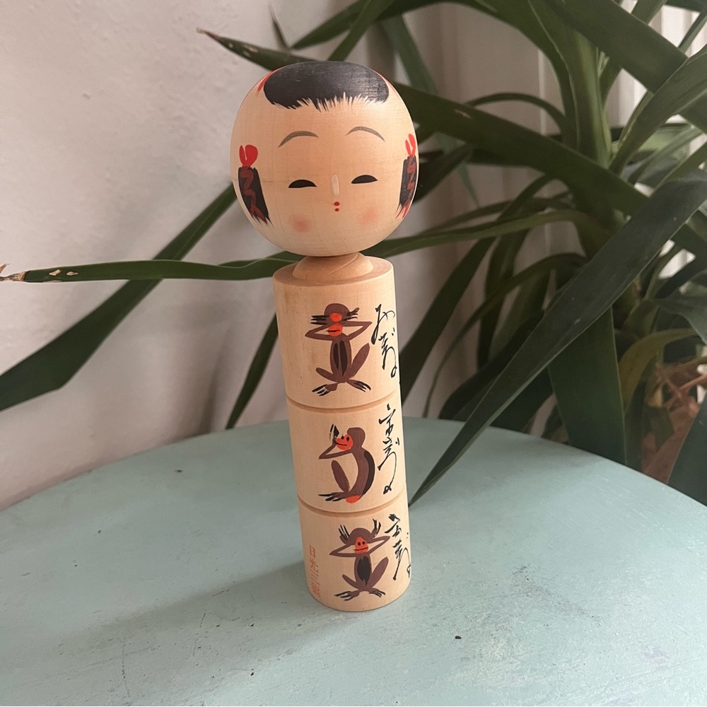 Japanese Kokeshi Doll With Monkey Pattern